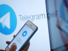 Логотип мессенджера Telegram на экране монитора и телефона - РИА Новости, 1920, 23.03.2026