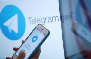 Логотип мессенджера Telegram на экране монитора и телефона - РИА Новости, 1920, 23.03.2026