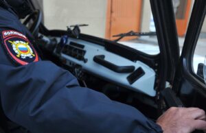 Полицейский в автомобиле - РИА Новости, 1920, 14.04.2026