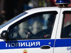 Сотрудник правоохранительных органов в полицейской машине в центре Москвы - РИА Новости, 1920, 09.09.2026
